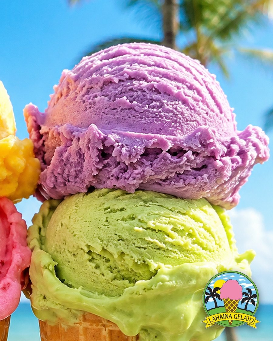 Taro and pistachio gelato stacked on a waffle cone